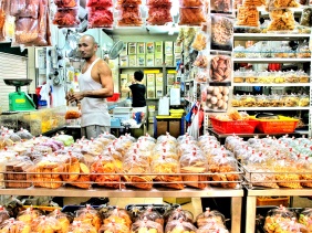 Junk food at the market in Singapore selling biscuits, dried fruits, and other snacks | Shopkeeper Stories